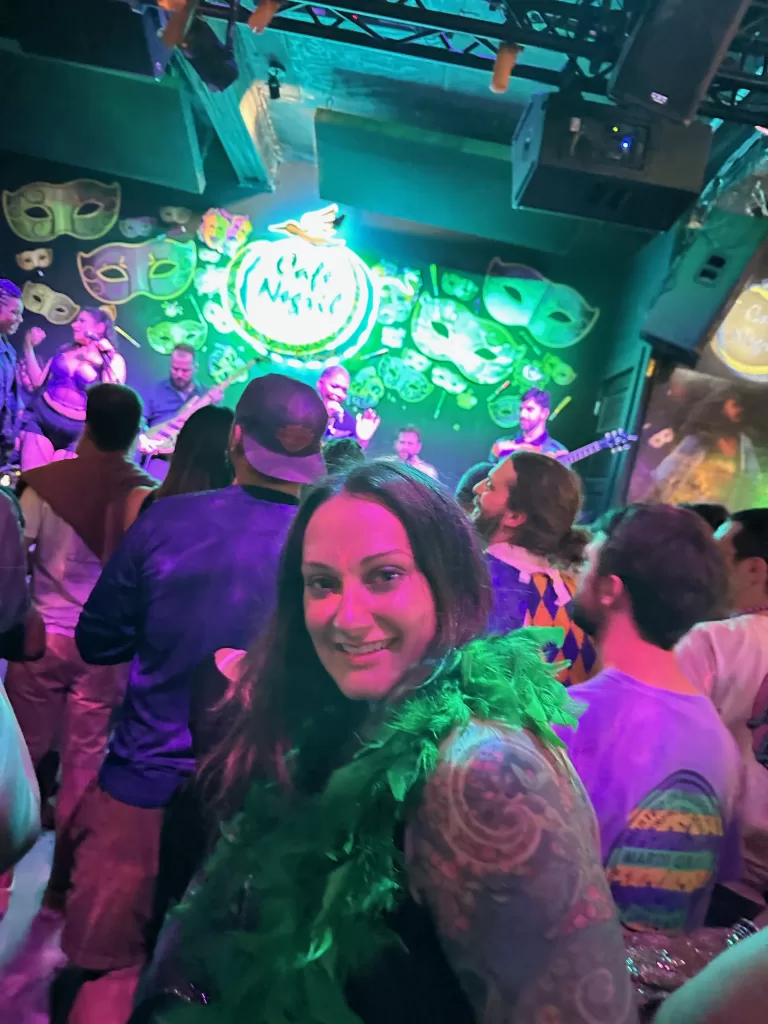 Woman at Cafe Negril in front of stage on Frenchmen Street in New Orleans