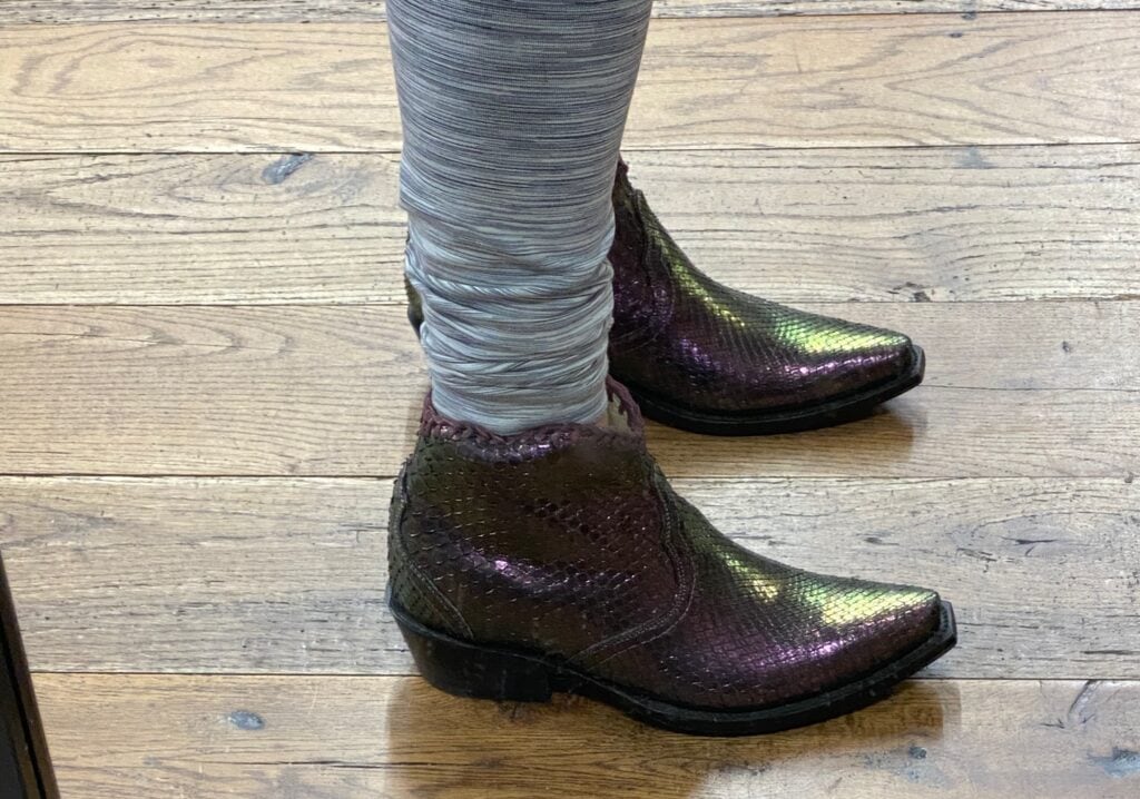 purple python cowboy boots closeup