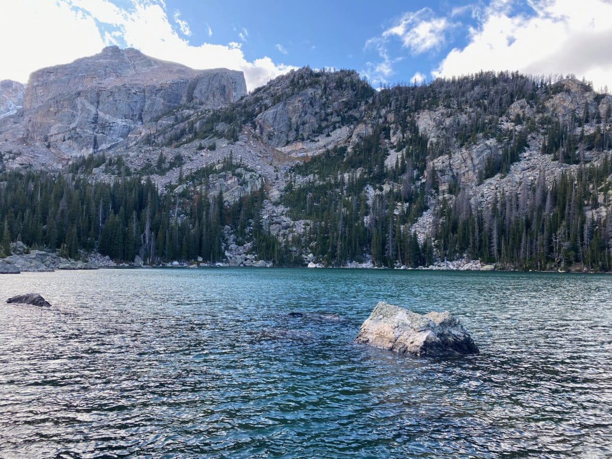 Pretty turquoise lake surrounded by mountains, Lake Haiyaha hike at Rocky Mountain National Park