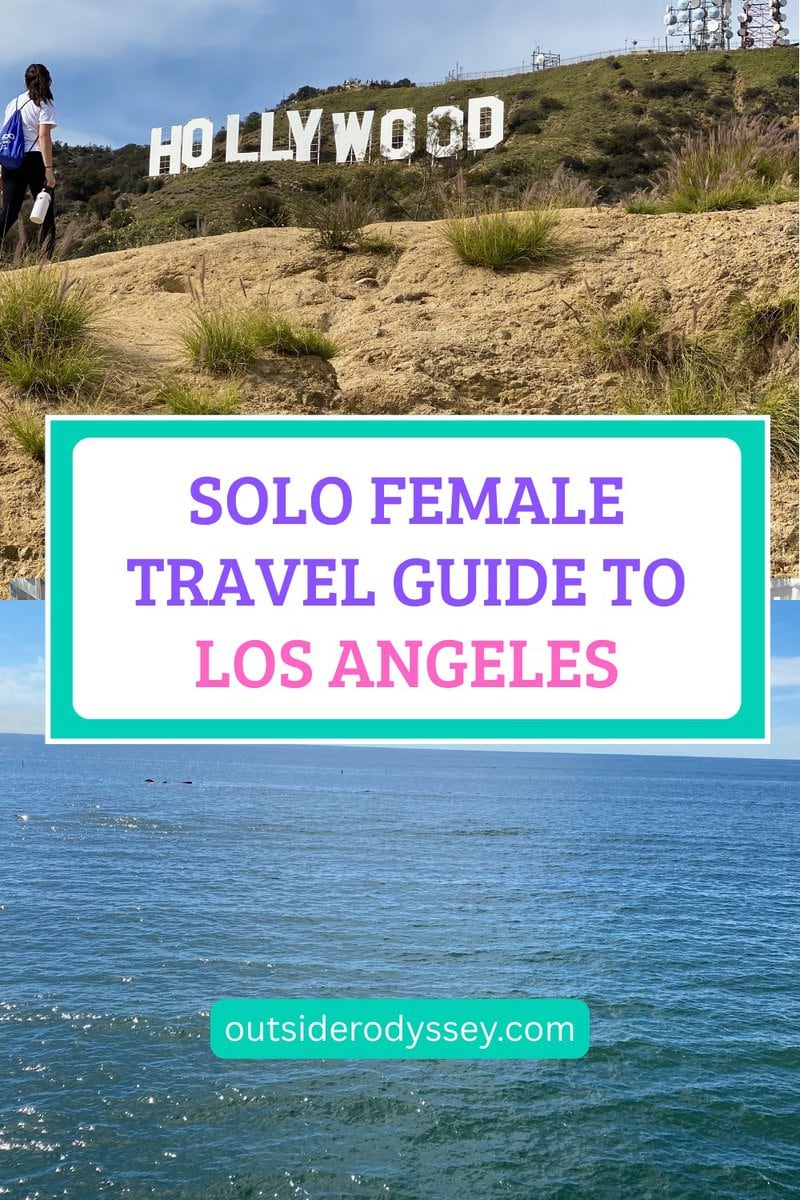 A woman hikes near the Hollywood sign with the ocean below and a clear sky above. Text overlay reads: Solo Female Travel Guide to Los Angeles—discover the best things to do alone in Los Angeles. Website: outsiderodyssey.com.