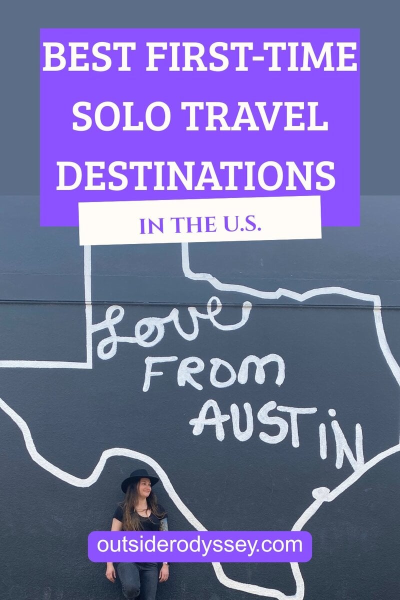 A woman in a black hat stands before a vibrant mural of the Texas outline with "Love From Austin." Overlaid text highlights Best First-Time Solo Travel Destinations in the U.S. and outsiderodyssey.com.